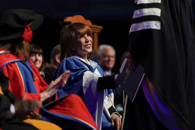 Student recieving their degree during Fall Convocation