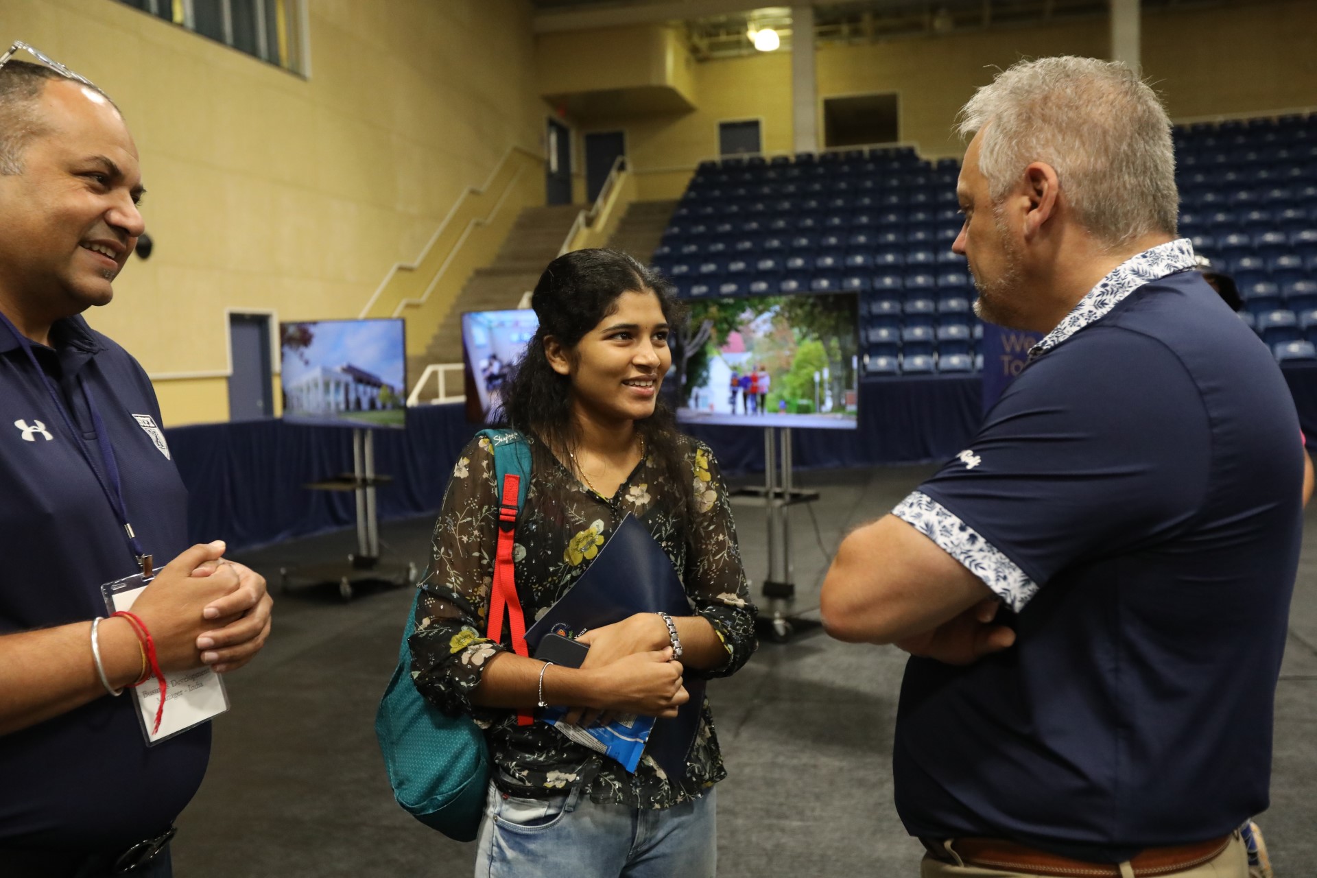 Dr. Andy Hakin speaks with an international student and student recruiter at Welcome Day. Dr. Andy Hakin speaks with an international student and student recruiter at Welcome Day.