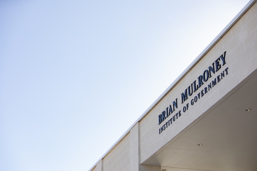 Building with large letter reading Brian Mulroney Institute of Government against a blue sky.