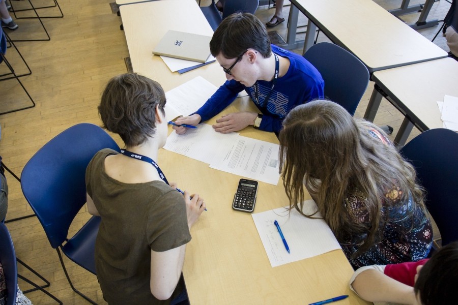 Picture of math camp members working together