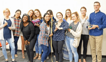 People standing together for a photo.