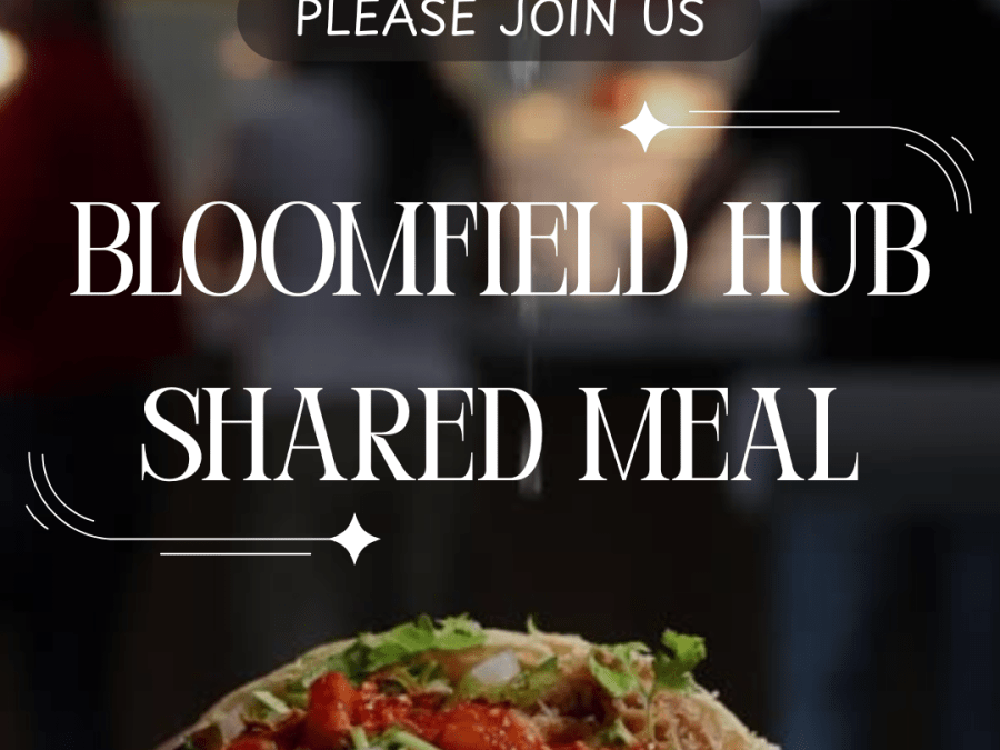 Dark grey background with an image of a hand squeezing lime onto an open taco. White text inviting you to Bloomfield Hub Shared Meal on Wednesday, November 12